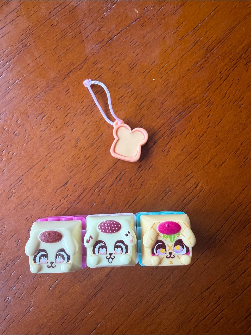 Bundle of 3 Sanrio PomPom Clickeez with cute toast charm included